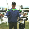 Golfer Brad Faxon bending the ProFitstick on the tee box